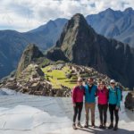 crea una imagen de 16:9 de un grupo de personas norteamericanas realiza una collage con las siguientes "HD Islas Ballestas  HD Ica City Tour + Laguna La Huacachina HD Sobrevuelo Líneas de Nazca Classic con tasa turística HD City Tour Cusco + Parque Arqueológico FD Machu Picchu - Tren Clase Turista Expedition con Almuerzo  FD Vinicunca – Montaña de 07 Colores con Almuerzo FD Ruta del Sol de Cusco – Puno con Almuerzo FD Islas de Uros y Taquile con Almuerzo Típico FD Tiwanaku en ruta de Puno a La Paz con Almuerzo FD Salar de Uyuni HD City Tour La Paz + Valle de la Luna"